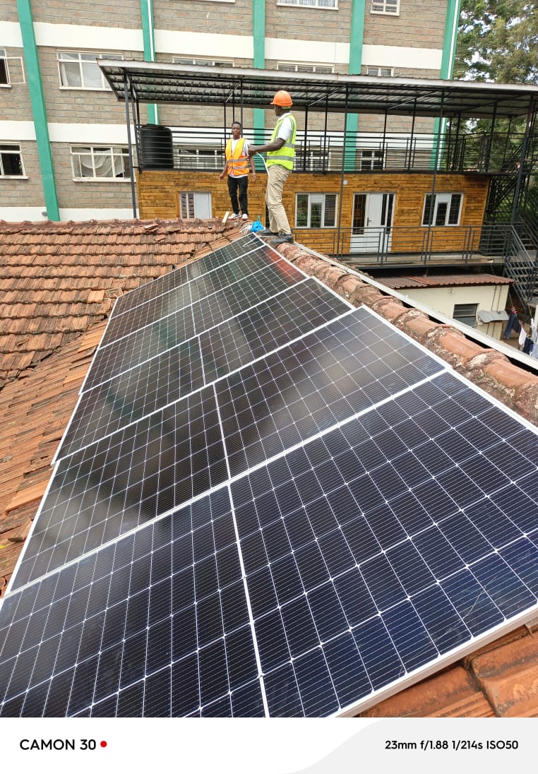 Kamatye team installing solar panels at Spur Mall Ruiru